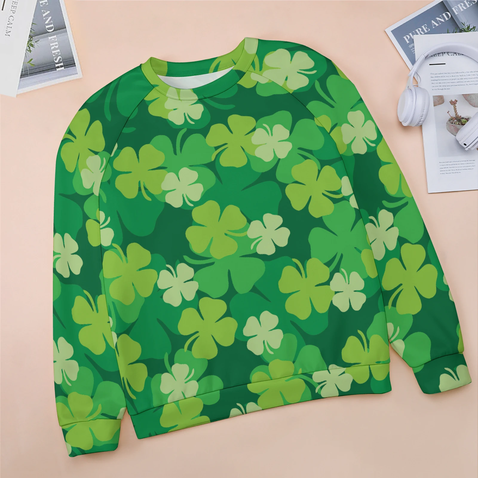 Women's Raglan Crew Neck Sweatshirt in Green Clover Scatter print – front flat lay