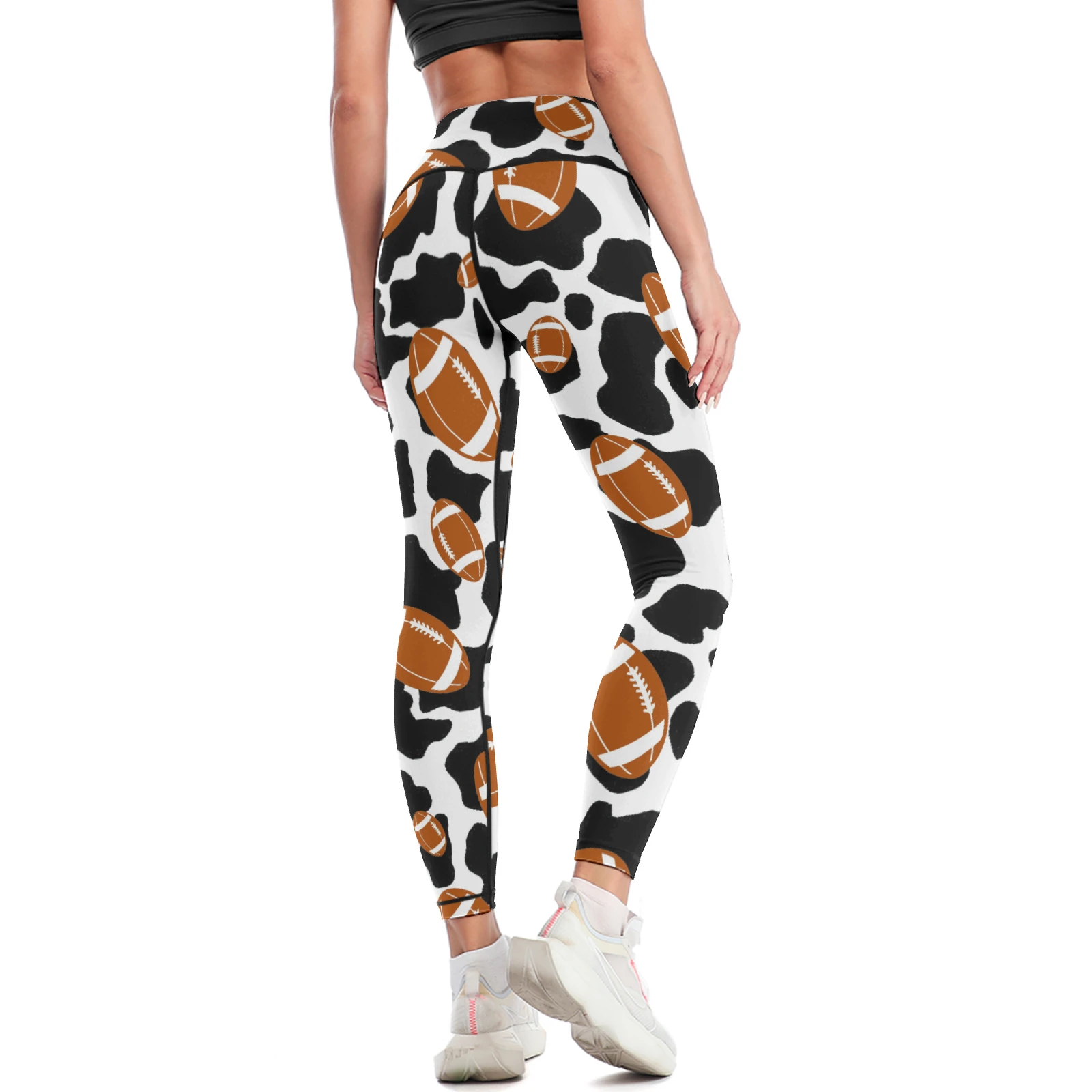 Women's High-Waist Yoga Leggings in Footballs And Cow Spots print – back three-quarter view