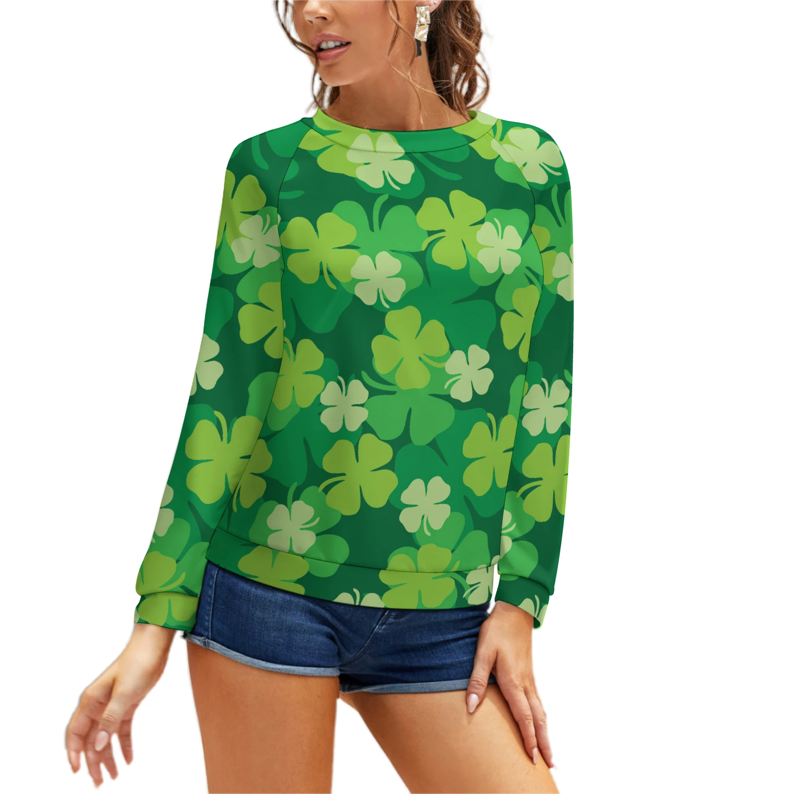 Women's Raglan Crew Neck Sweatshirt in Green Clover Scatter print – model with denim shorts