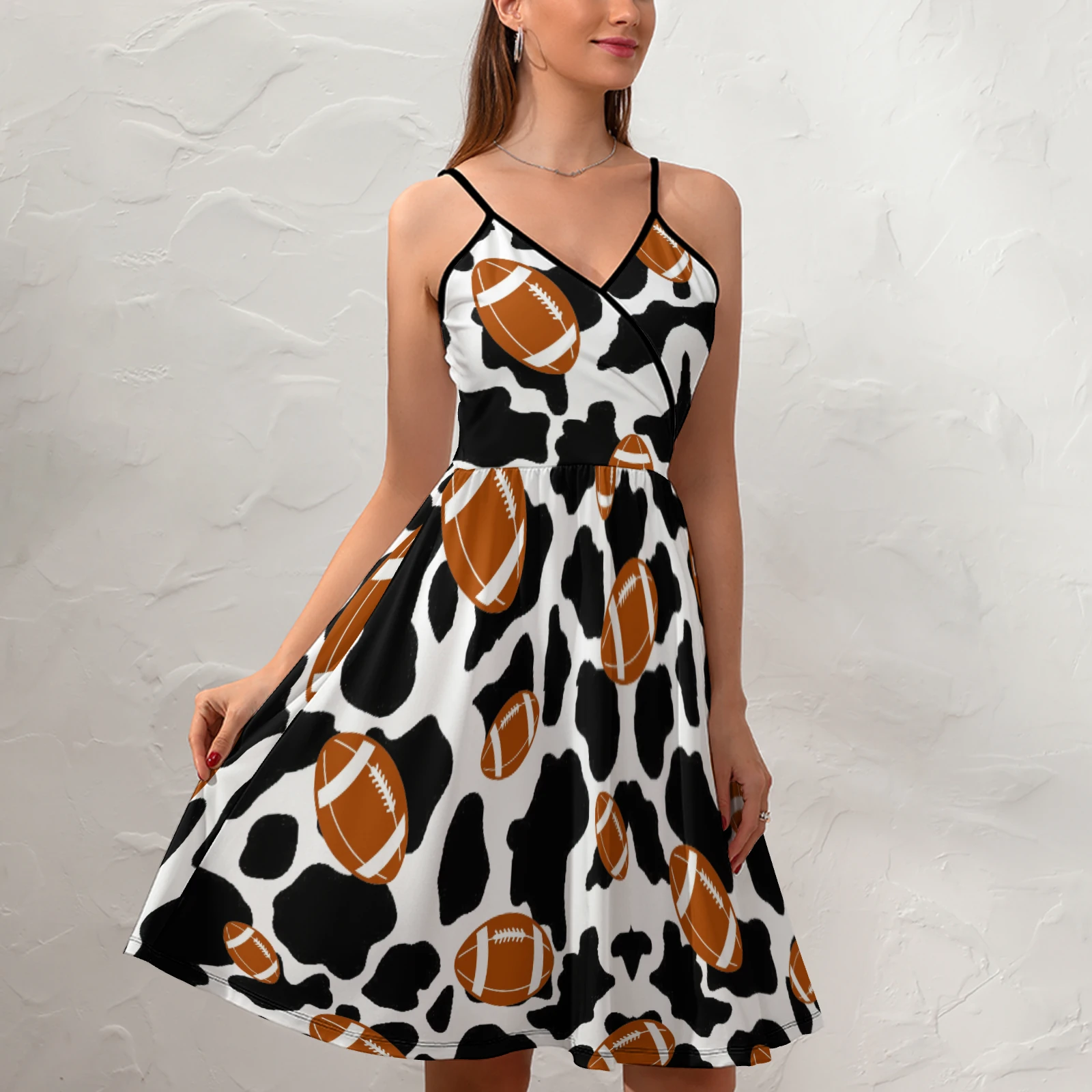 Women's V-Neck Cami Skater Dress in Footballs And Cow Spots print – front lifestyle view