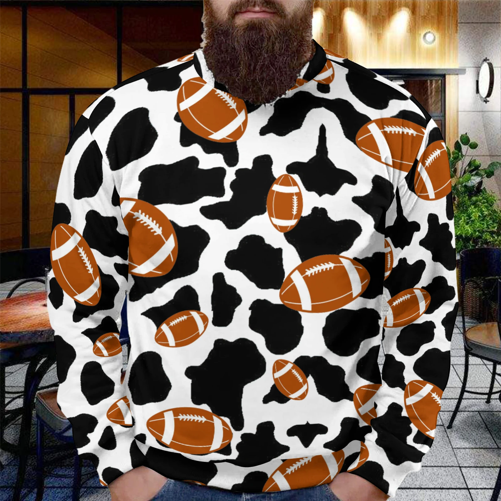 Men's Crew Neck Sweatshirt in Footballs And Cow Spots print – outdoor lifestyle shot